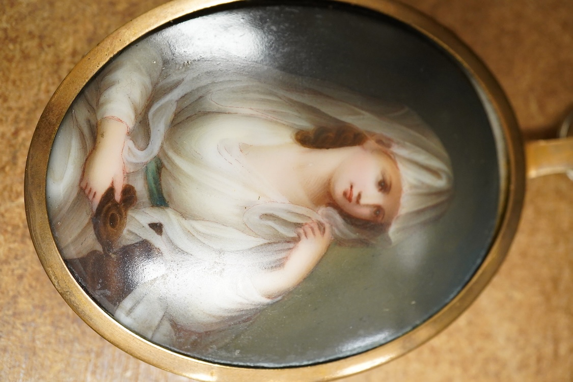 Two 19th century silhouette portraits to include one painted on glass by R. N. Barnes 1836 together with a portrait miniature of a Regency lady and an enamel example, largest 8 x 6.5cm (4)